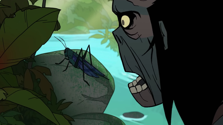 Spear looks at a cricket on a rock in Primal Season 3