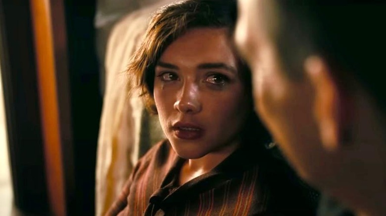 Jean tearfully looking at Robert