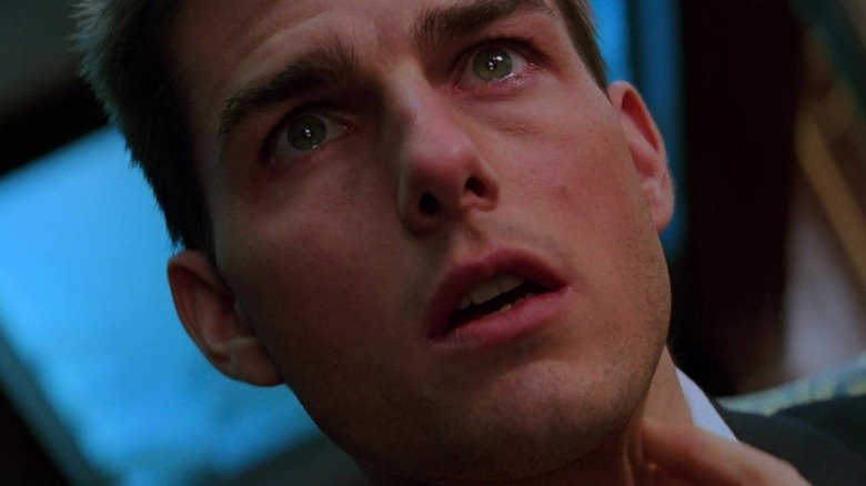 Tom Cruise is agape in a dutch angle as Ethan Hunt in Mission: Impossible