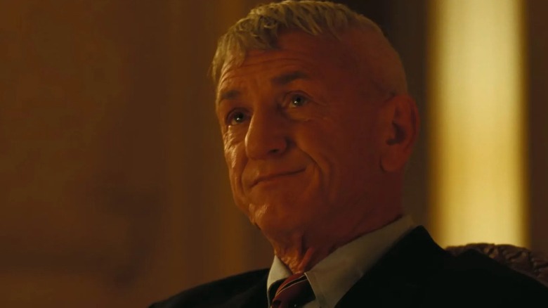 Colonel Steven Lockjaw listening in One Battle After Another