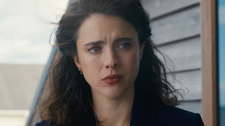 Margaret Qualley's Maya looking sad outside a house in Love of Your Life