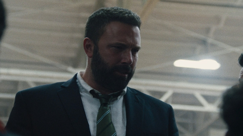 Ben Affleck's Jack Cunningham is seen from a low angle as he stands in a gym in The Way Back