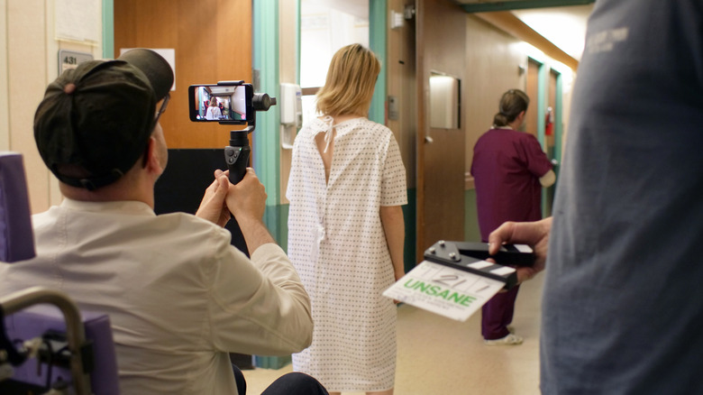 Behind the scenes photo from Unsane with Steven Soderbergh filming Clare Foy on an iPhone rig