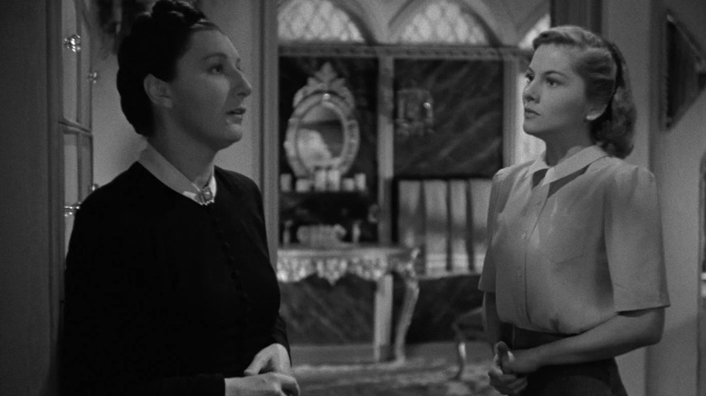 Mrs. Danvers telling a story to Mrs. de Winter
