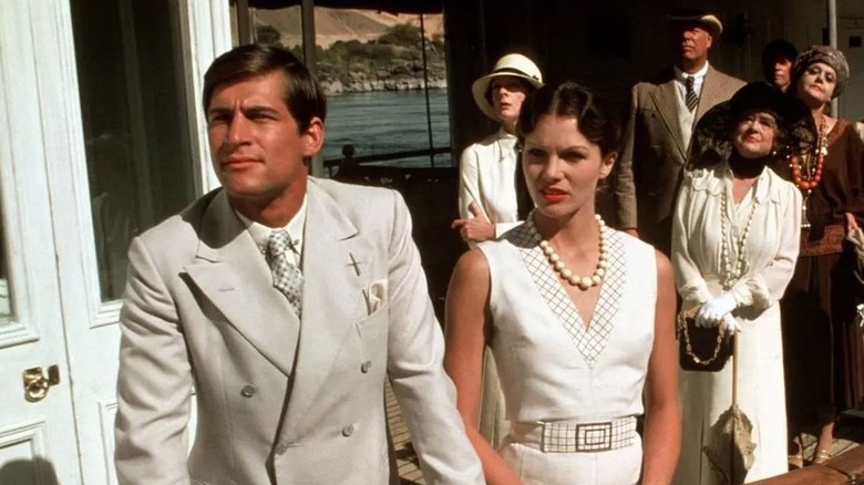 Simon and Linnet looking confused in front of a crowd in Death on the Nile