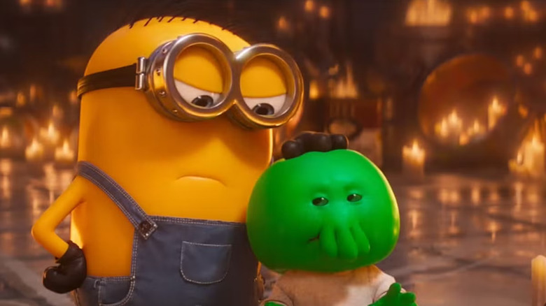 James looking down at Goomi in Minions & Monsters