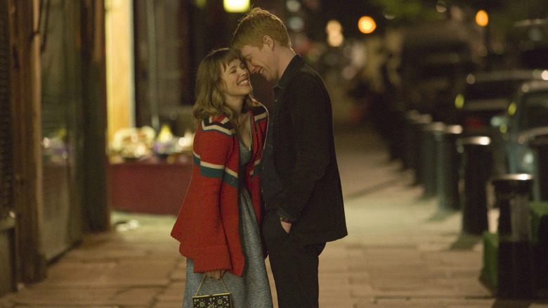 Tim and Mary about to kiss on a London street in About Time