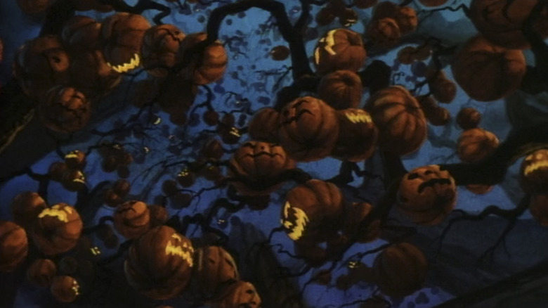 A tree festooned with jack o' lanterns in The Halloween Tree