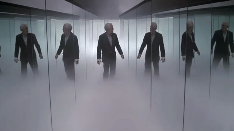 A man trapped in a hall of mirrors in Something Wicked this Way Comes