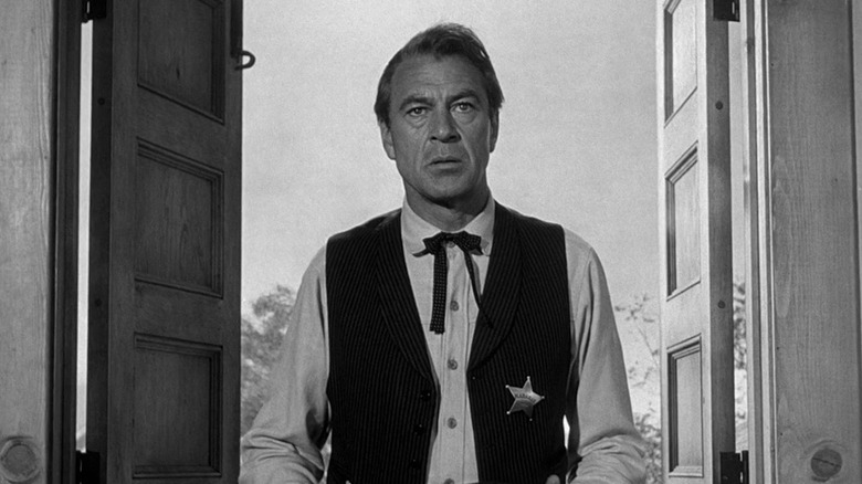 Marshal Will Kane (Gary Cooper) in his police uniform and bolo tie in High Noon
