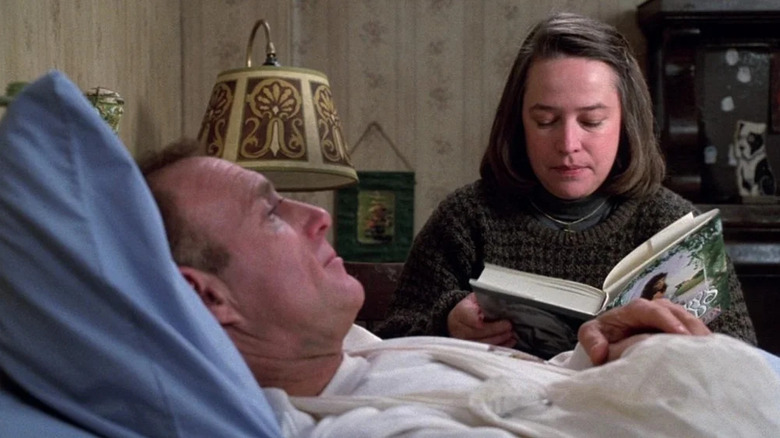 Annie reading to Paul in bed in Misery
