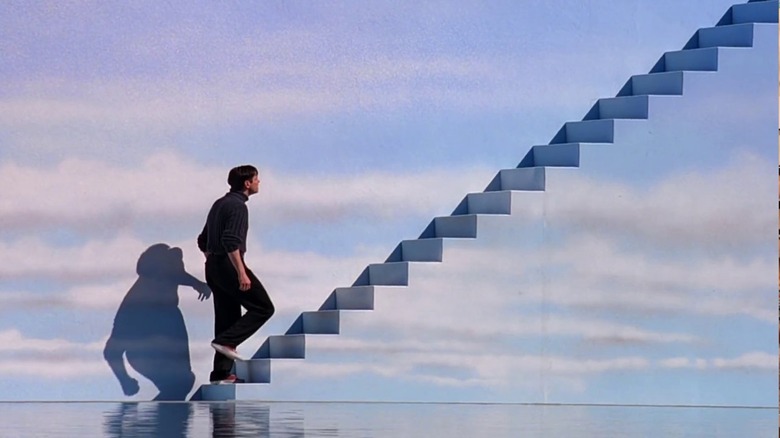 Truman Burbank walking up stairs in The Truman Show