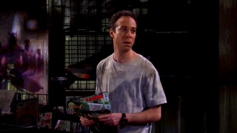 Stuart in his burned ruined comic book store on The Big Bang Theory