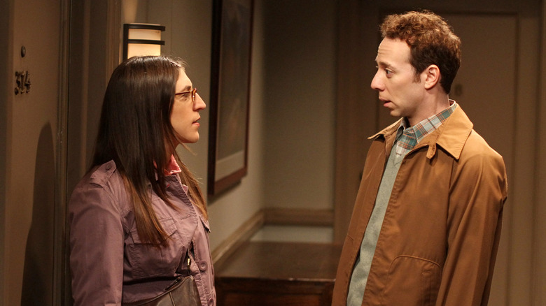 Amy and Stuart talking outside of her apartment on The Big Bang Theory