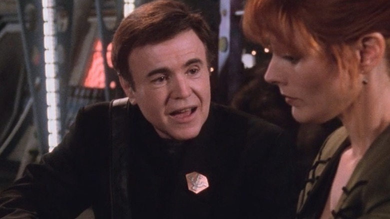 Alfred Bester talking to someone on Babylon 5