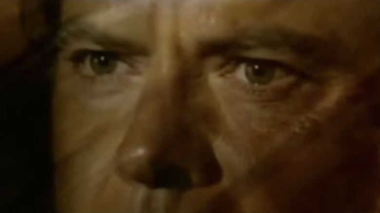 Robert Urich's James Cathcart is seen in extreme closeup during the title sequence for The Lazarus Man
