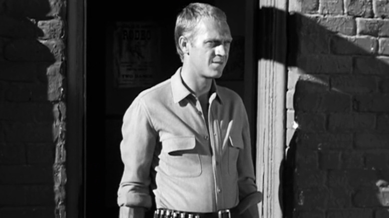 Steve McQueen's Josh Randall is seen standing in a doorway in Wanted Dead or Alive
