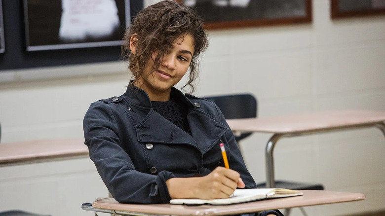 MJ sitting in class smirking in Spider-Man: Homecoming
