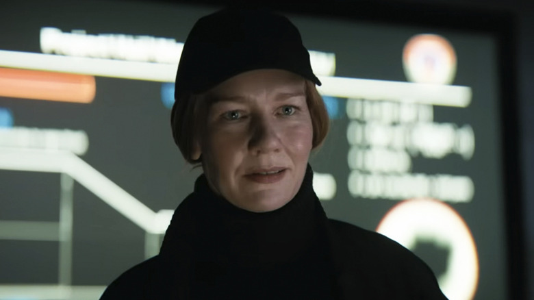 Sandra Hüller as Eva Stratt smiling in front of a screen in Project Hail Mary