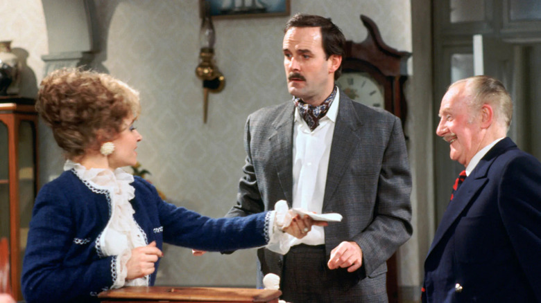 Sybil and Basil Fawlty with the Major in Fawlty Towers