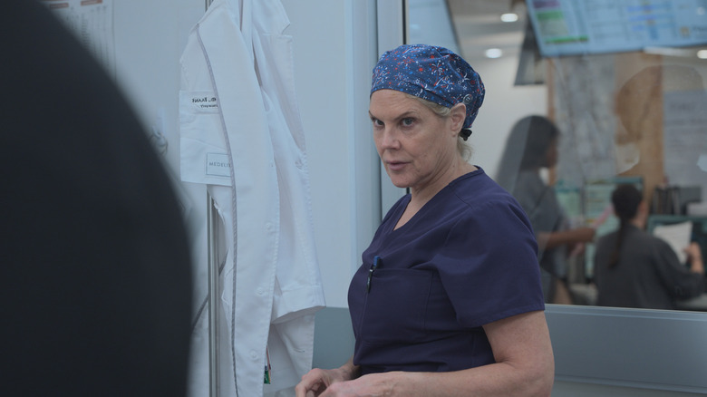 Dr. Conley in a scrub cap on The Pitt