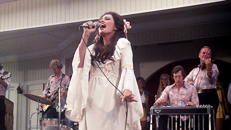 Barbara Jean singing in front of her band in Nashville