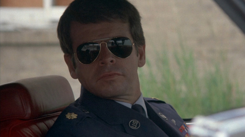 Major Charles Rane wearing sunglasses in Rolling Thunder
