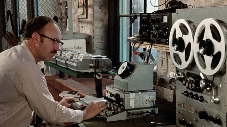 Harry Caul looking at his recoding devices in The Conversation