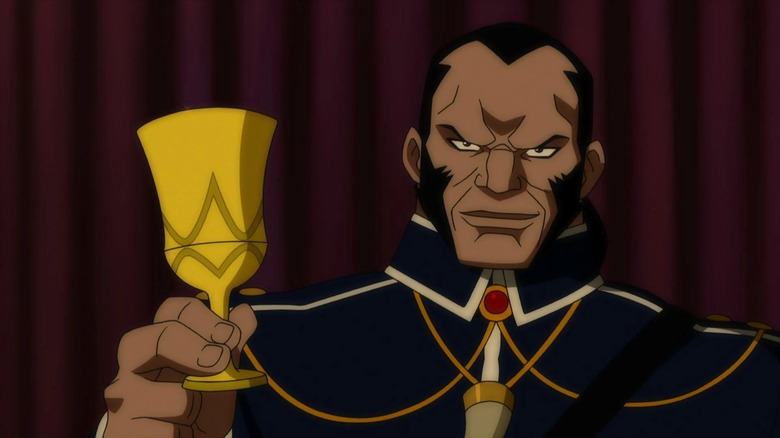 Vandal Savage holding up golden goblet in Justice League: Doom