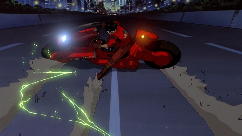 Kaneda sliding with his bike in the coolest moment in cinema in Akira