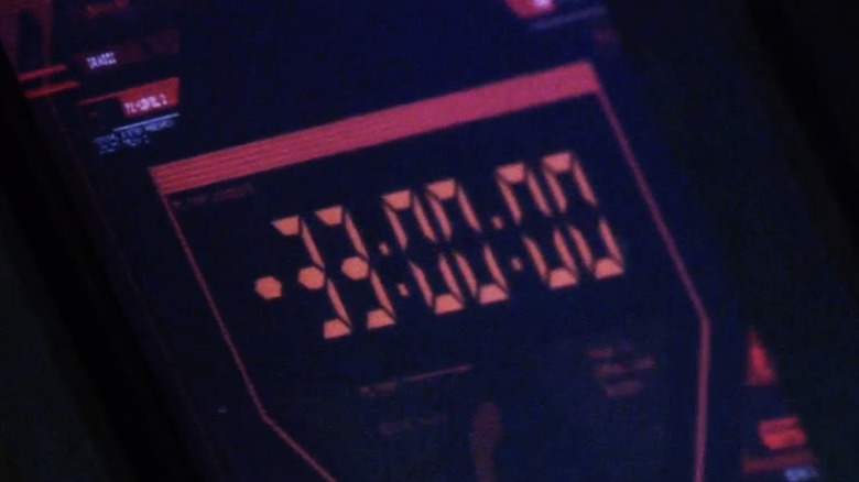 Battlestar Galactica -- digital timer clock showing 33 minutes