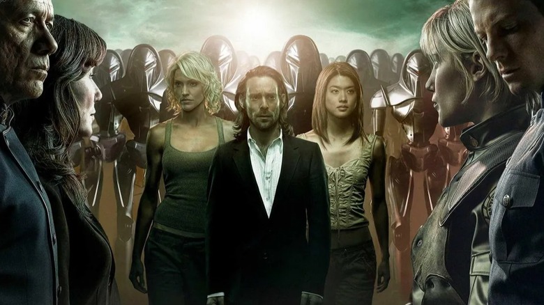 Battlestar Galactica poster: Adama, Roslin, Starbuck and Lee on opposite sides, with Six, Baltar, Boomer and Cylon Centurions in between