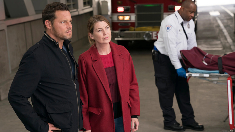 Alex and Meredith looking at the rail car confused on Grey's Anatomy