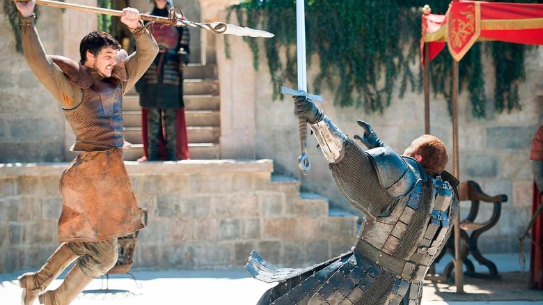Oberyn jumping and wielding his spear at The Mountain on Game of Thrones