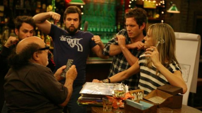 The entire gang playing a bar game in It's Always Sunny in Philadelphia