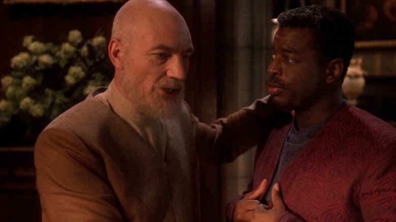 An elderly Picard and an elderly Geordi in a study on Star Trek: The Next Generation