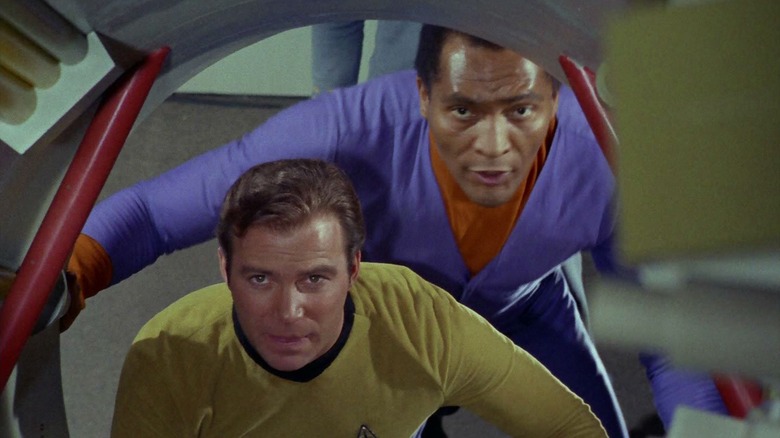 Kirk and Dr. Daystrom looking up a jeffries tube on Star Trek