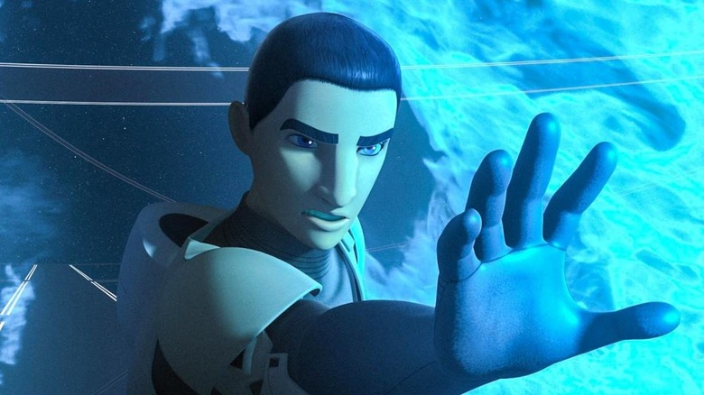 Taylor Gray as Ezra resisting blue flames with his hand in Star Wars Rebels