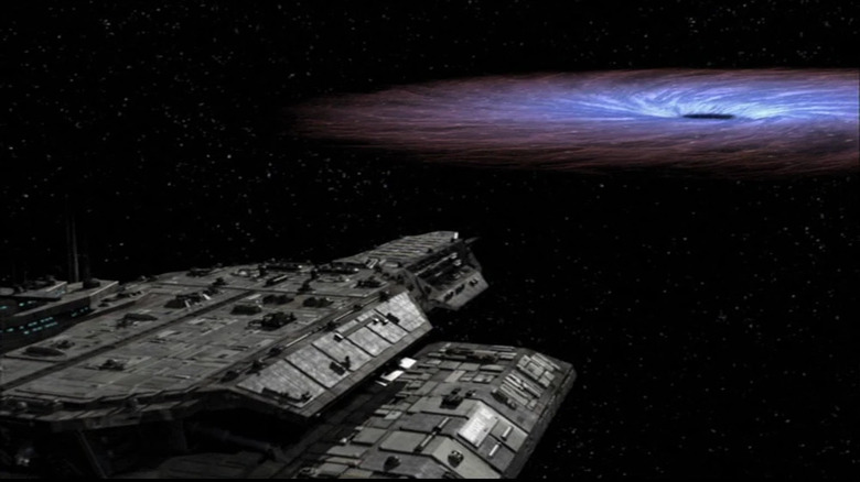 The Odyssey approaching a black hole on Stargate SG-1