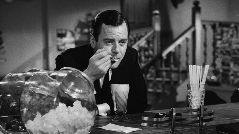 Martin Sloan sadly eating ice cream in The Twilight Zone