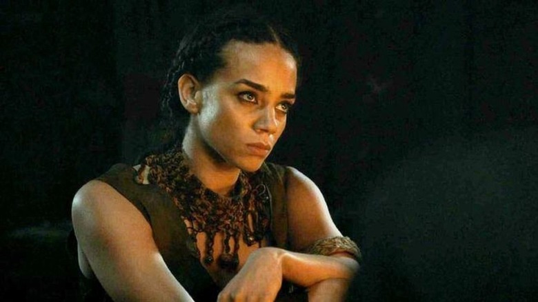 Ornela looking into a fire in Game of Thrones