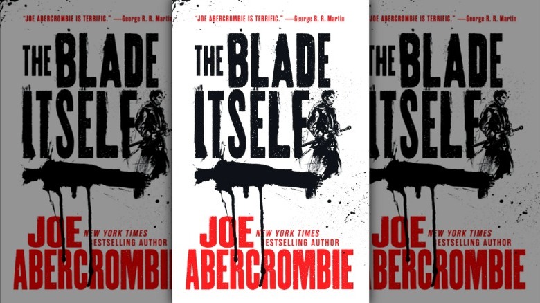 A figure carrying a sword on the cover of The Blade Itself