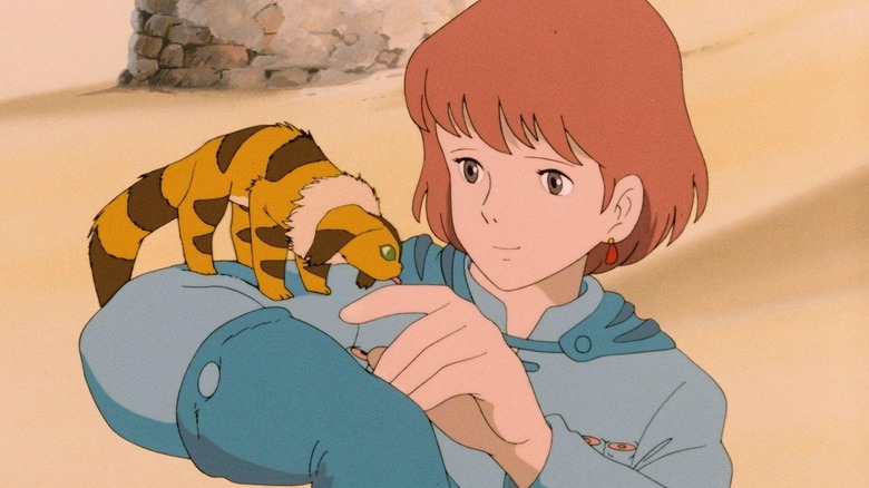 Nausicaa playing with her pet critter in Nausicaä of the Valley of the Wind
