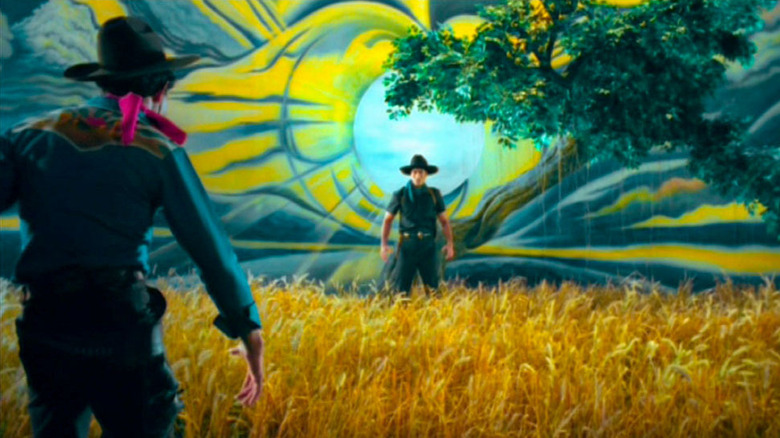 Dum facing down a foe, the sky is a wild colorful painting, in Tears of the Black Tiger