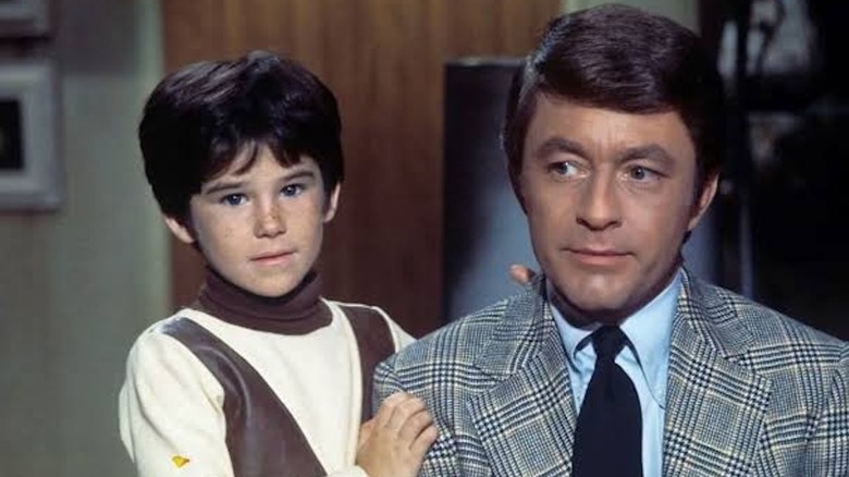 Brandon Cruz as Eddie Corbett stands by Bill Bixby as Tom Corbett in The Courtship of Eddie's Father