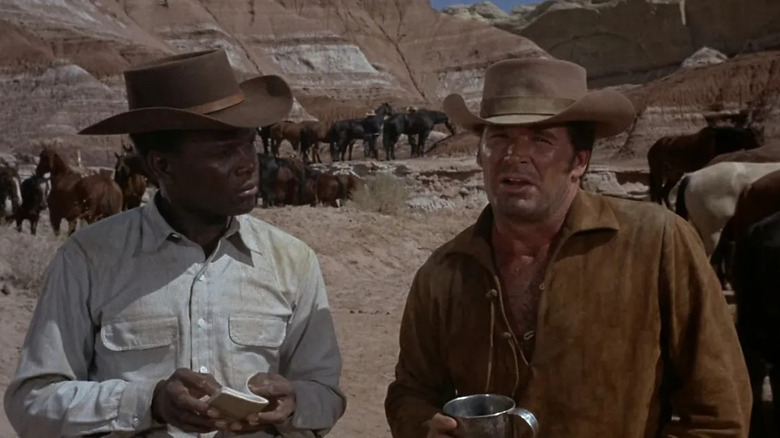 Jess (James Garner) and Toller (Sidney Poitier) standing next to each other in "Duel at Diablo"