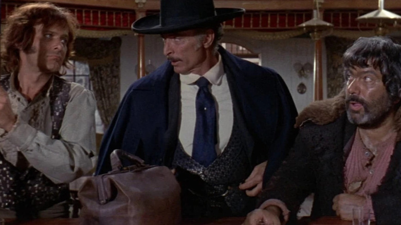 Sabata (Lee Van Cleef) standing between Banjo (William Berger) and Carrincha (Ignazio Spalla) in "Sabata"
