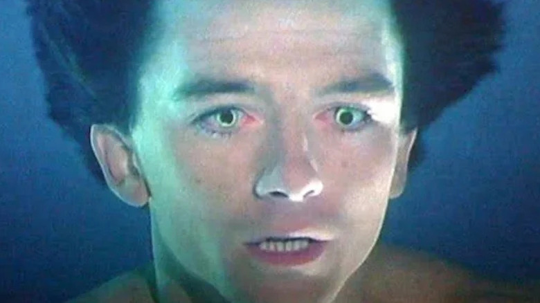 The eyes of Mark Harris (Patrick Duffy) glow underwater in Man from Atlantis