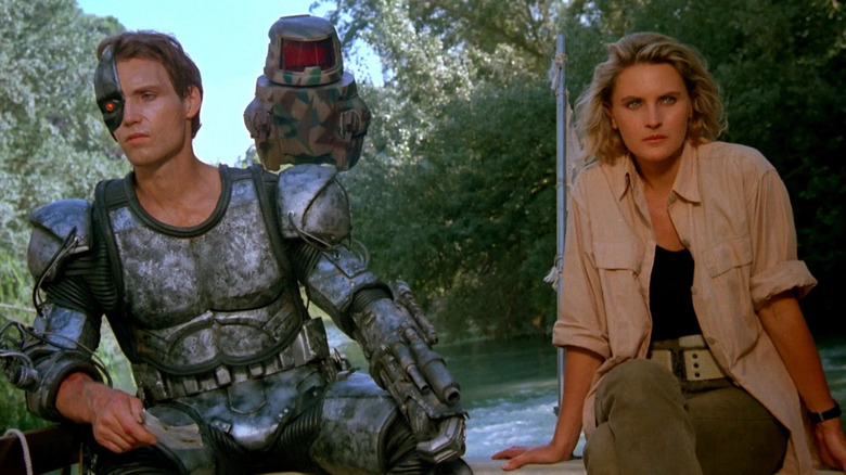 The Mandroid and Colonel Hunter on a boat in Eliminators