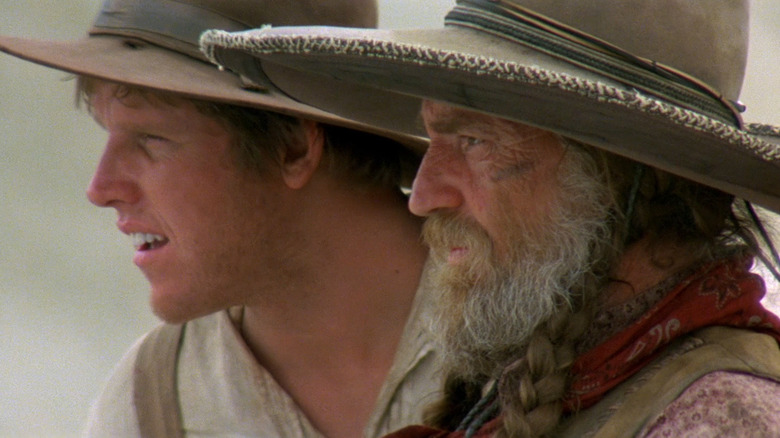 Karl (Gary Busey) and Barbarosa (Willie Nelson) looking ahead in "Barbarosa"